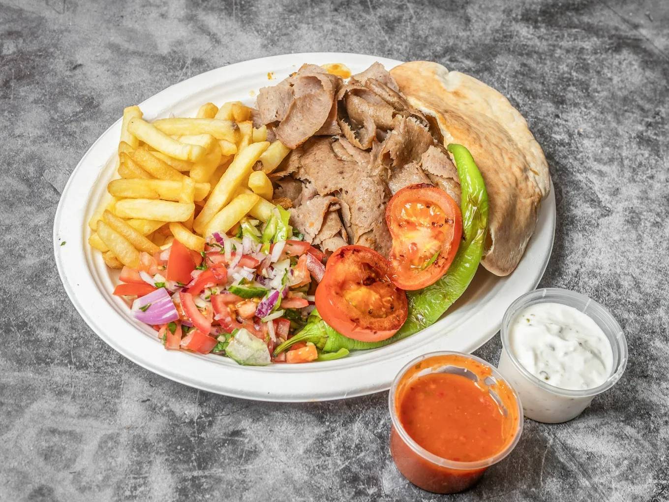 Kebabs with salad and sauce served at Istanbul Dunfermline
